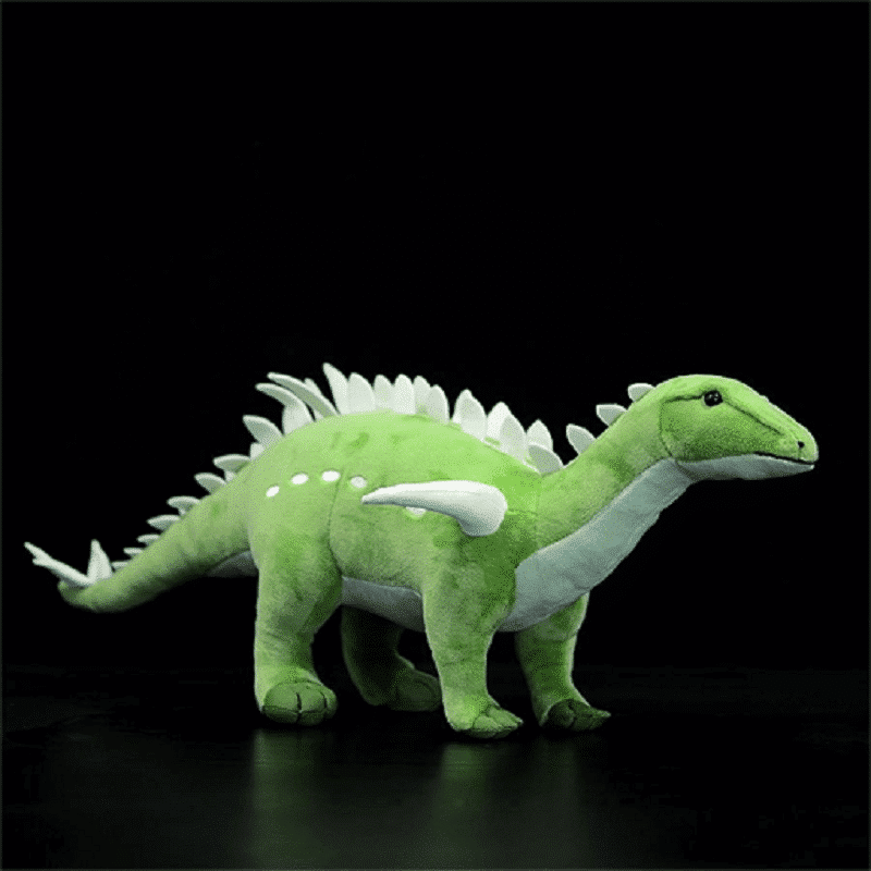 Peluche réaliste dinosaure sur un fond noirscrewrosaurus vert sur un fond noir