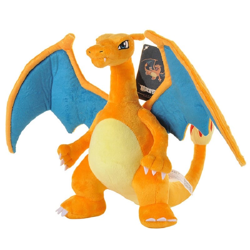 Peluche Dracaufeu géante orange mignon sur un fond blanc