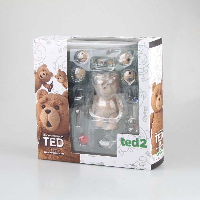 Peluche Ted marron adulte dans un carton