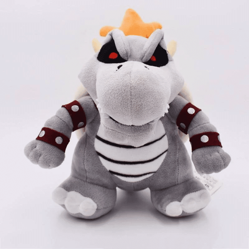 Peluche Mario dragon de feux gris sur un fond gris